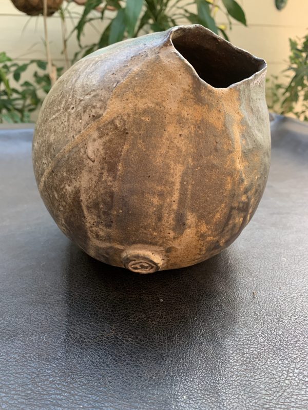 Australian handmade ceramic vase Flintstone designs